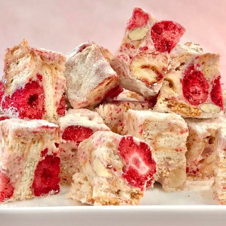 Handmade snowflake crisps with strawberries and almonds, no-bake chewy dessert squares